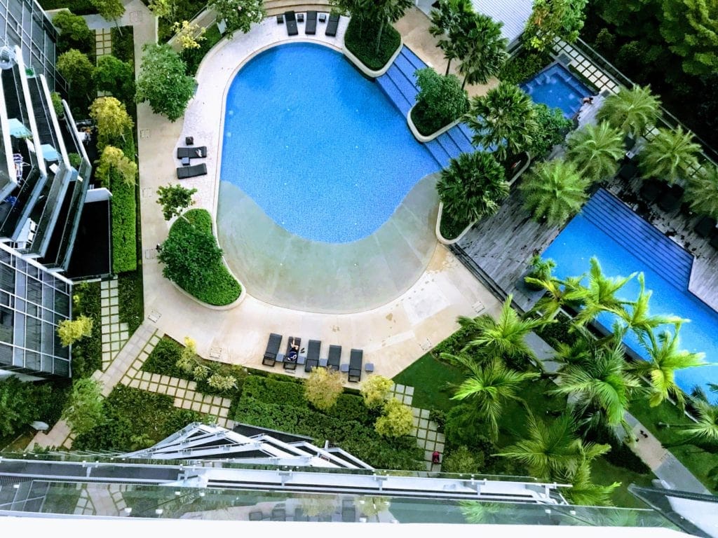 aerial photography of pools outside buildings