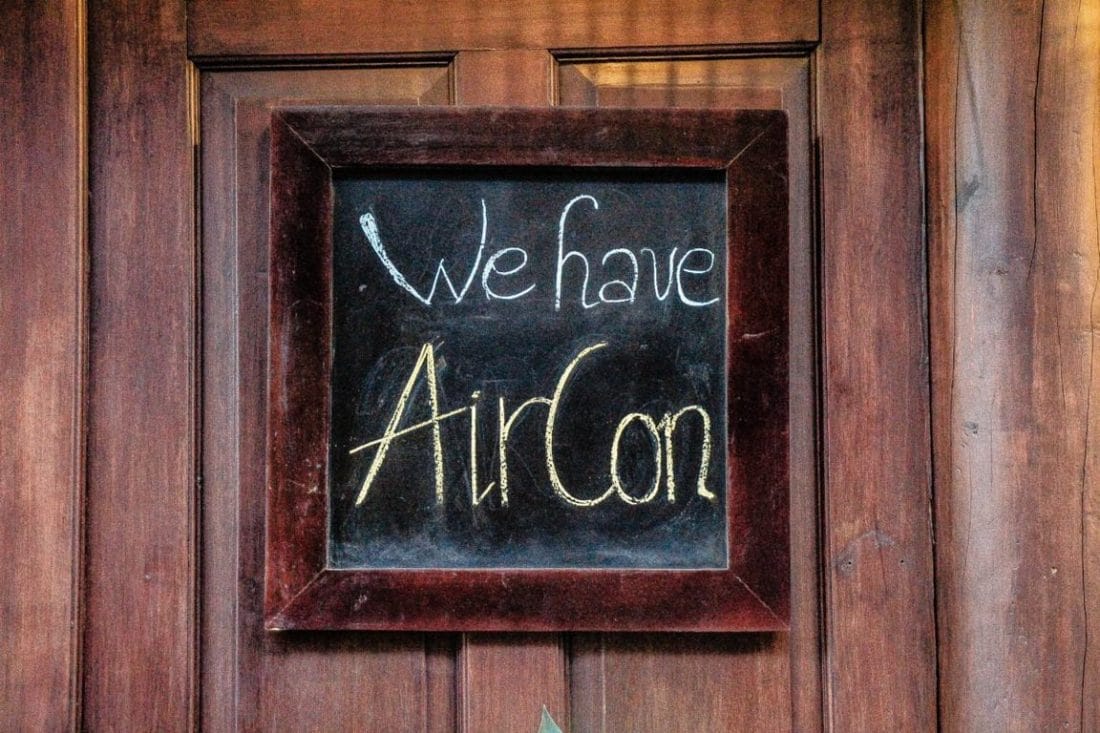 "We have AirCon" - I liked this wood/chalkboard sign in Hoi An, Vietnam inviting people inside from the heat.